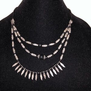 Handcrafted Native American feathers, black stones